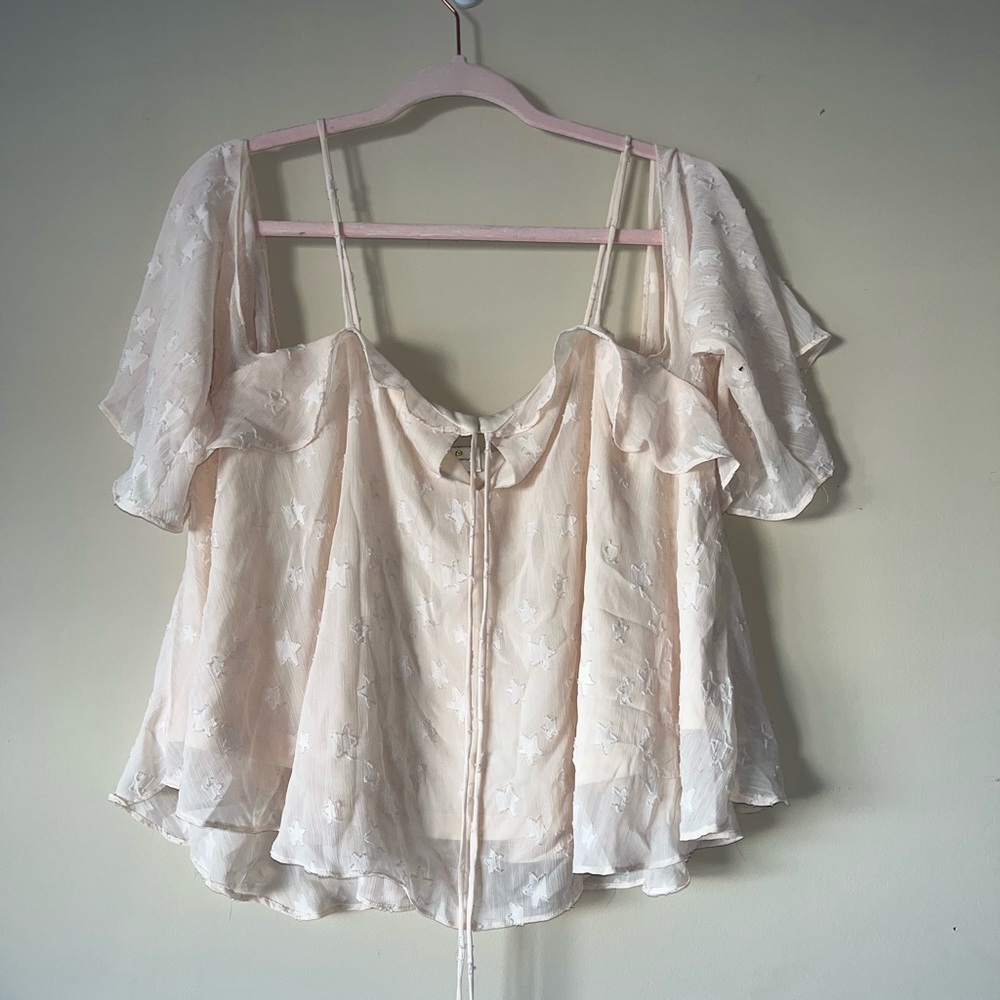 Cream blouse.